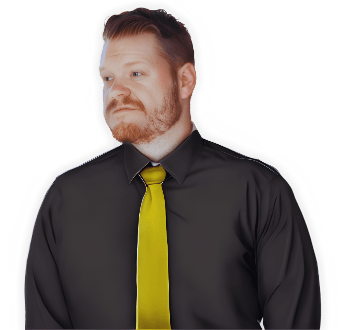 Morgan McKell, founder of Strategy Zoo, wearing a black shirt and yellow tie