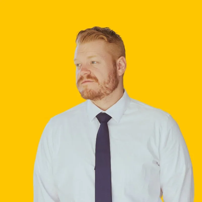 Morgan McKell, founder of Strategy Zoo in Pocatello Idaho, press headshot on brand yellow background