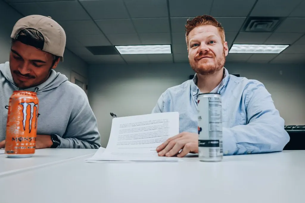 Morgan McKell working through a marketing strategy document with a business owner