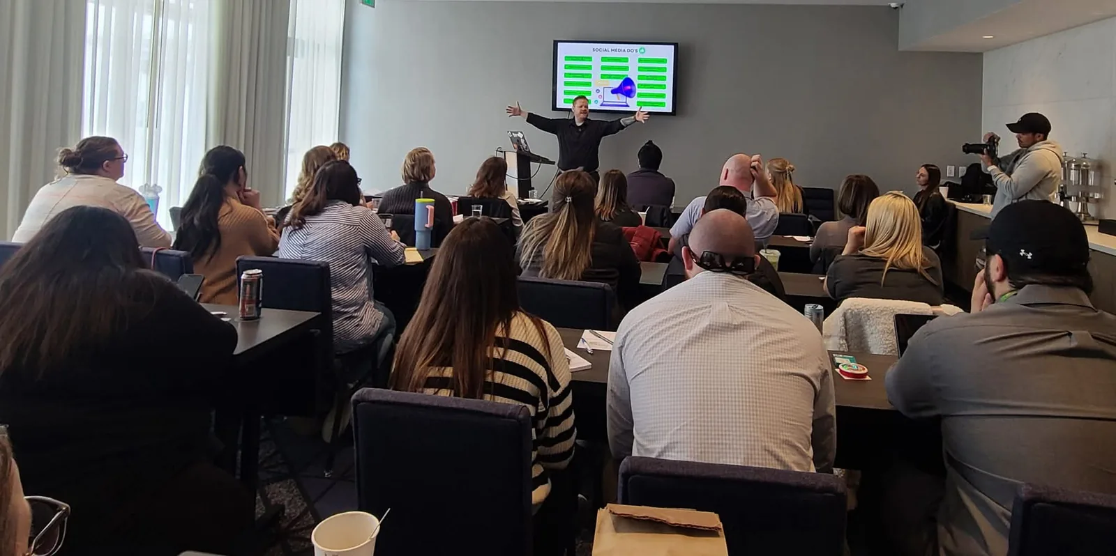 Morgan McKell teaching a social media marketing workshop to a full conference room