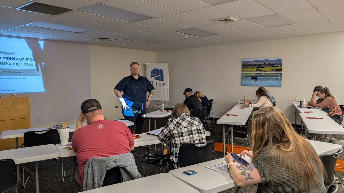 Attendees working through their marketing plan at a Strategy Zoo workshop at Portneuf Health Trust